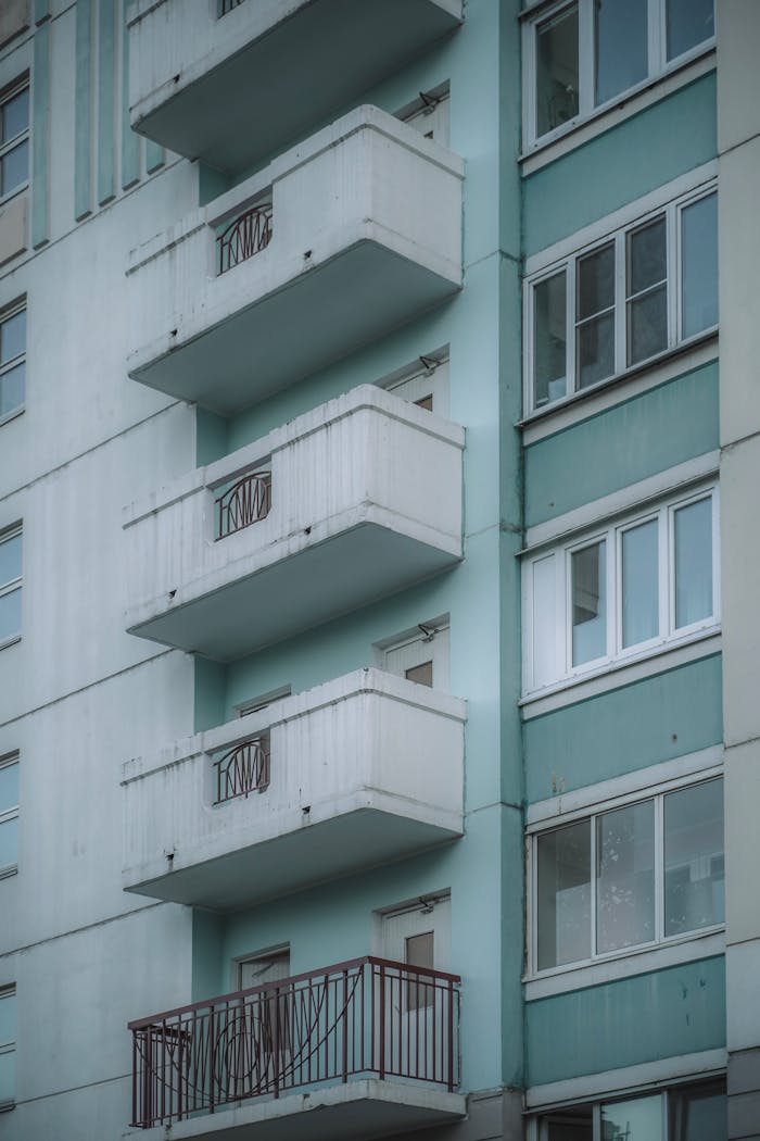 Close-Up Photo of a White and Green Building